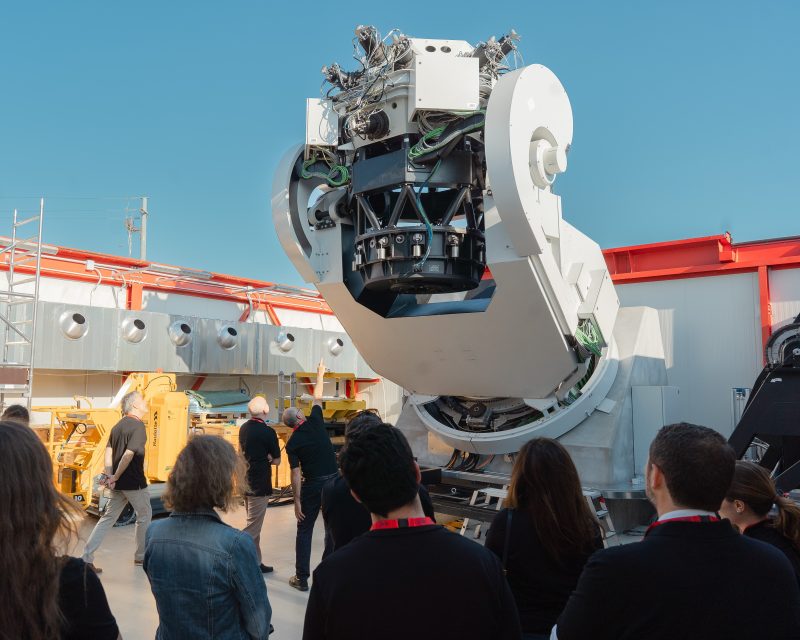 Delegates visiting ESA's new Flyeye asteroid-hunting telescope at the factory in Matera, Italy, during its final test campaign.