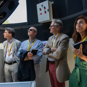 Image of four people looking up at something ©ICONIC Digital Agency
